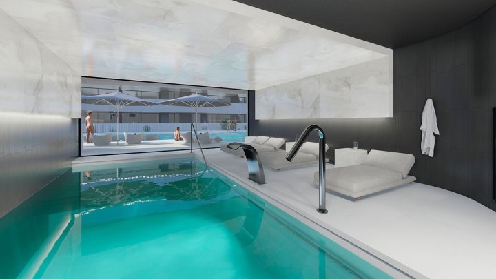 Appartements mit 2 Schlafzimmern, 2 Bädern, Klimaanlage und Einbauküchen mit Elektrogeräten in abgeschlossener Anlage mit Gemeinschaftspool und SPA