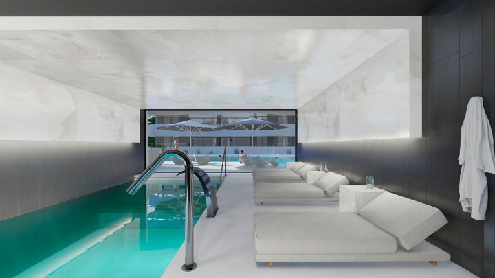 Appartements mit 2 Schlafzimmern, 2 Bädern, Klimaanlage und Einbauküchen mit Elektrogeräten in abgeschlossener Anlage mit Gemeinschaftspool und SPA