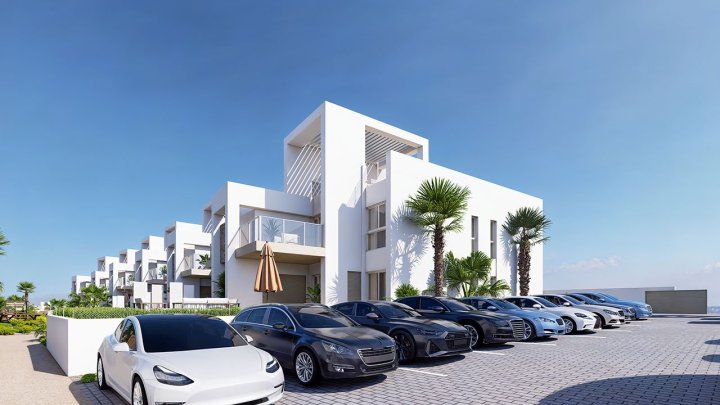 Obergeschoss-Wohnungen mit 2 Schlafzimmern, 2 Bädern, Dachterrasse, Klimaanlage, Einbauküchen mit Elektrogeräten, Kfz-Stellplatz und Gemeinschaftspool