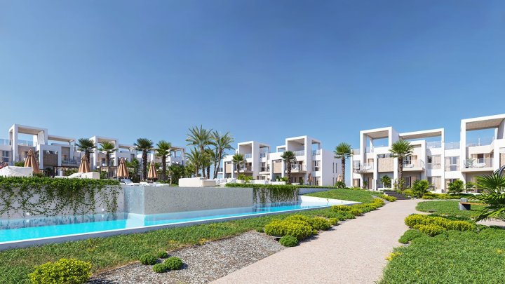 Obergeschoss-Wohnungen mit 3 Schlafzimmern, 2 Bädern, Dachterrasse, Klimaanlage, Einbauküchen mit Elektrogeräten, Kfz-Stellplatz und Gemeinschaftspool