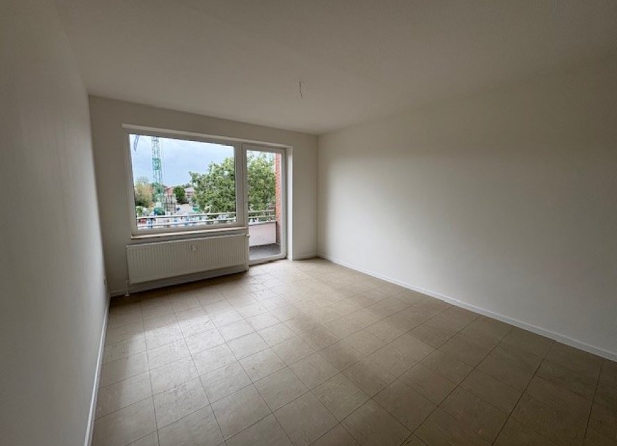 Wohnzimmer mit Balkon