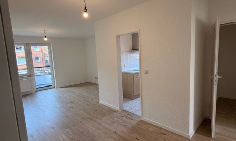 Eine Kaltmiete geschenkt: Sanierte 4-ZW mit Balkon Gutenbergring 32, Brunsbüttel - Otto Stöben GmbH!