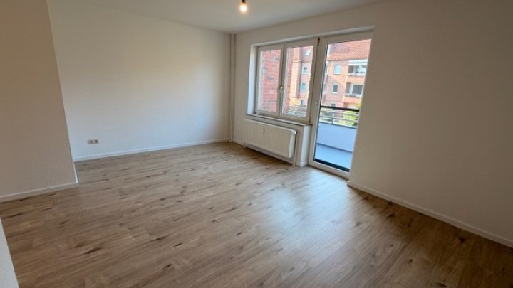 Eine Kaltmiete geschenkt: Sanierte 4-ZW mit Balkon Gutenbergring 32, Brunsbüttel - Otto Stöben GmbH!